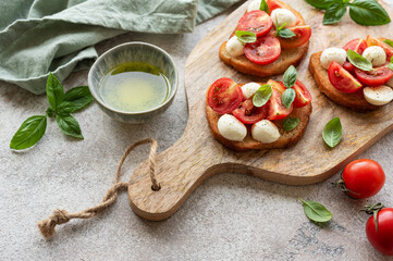 Bruschetta with tomato, basil and mozzarella cheese