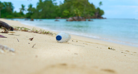 plastic bottle garbage pollution on beach stock photo