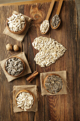 DRİED NUTS AND FRUİTS IN WOODEN BOWL ON BROWN FLOOR
