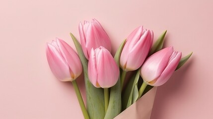 Bouquet of tulips in envelope. Flat lay top view