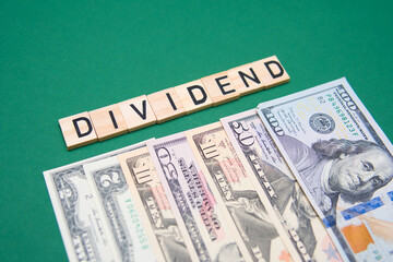 The inscription Dividend next to American dollars. The dividend is a distribution of profits by a corporation to its shareholders.