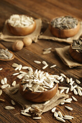 DRİED NUTS AND FRUİTS IN WOODEN BOWL ON BROWN FLOOR
