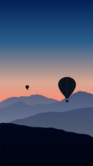 vector mountain and air balloons floating in the sunset sky
