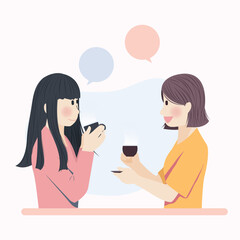 Cute Girls Chatting while drinking beverage