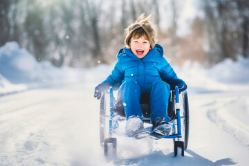kid in wheelchair playing in the snow - 636208033