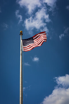 american flag against sky