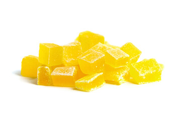 Dehydrated mango dices isolated on white. Dried mango cubes. Heap of candied diced fruits closeup