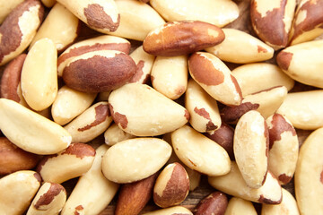 Brazil nuts background closeup. Shelled brazil nuts, top view