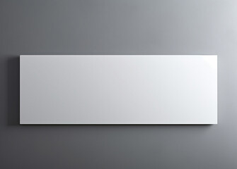 white sheet of paper on an grey wall