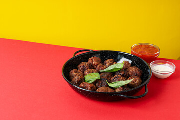 Tasty meat food and homemade food concept - meatballs