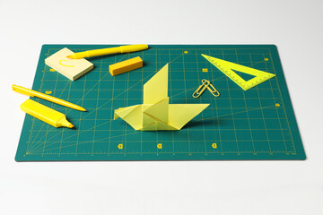 Patchwork accessories concept on white background, cutting mat