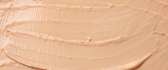 Texture of skin foundation as background, closeup