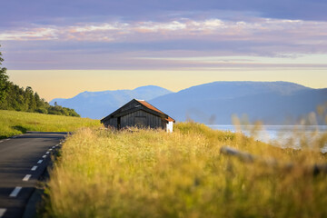 Fototapeta na wymiar Abandoned fishing barn at fjord