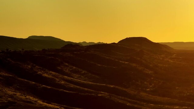 Simpson Desert Arid Outback Landscape In Yellow Sunlight, 4K Aerial Telephoto Drone Flyover Australia