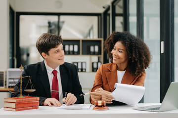 Business and Male lawyer or judge consult having team meeting with client, Law and Legal services concept.Customer service good cooperation in modern office