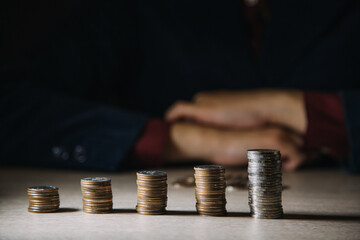 Money, Financial, Business Growth concept, Man's hand put money coins to stack of coins