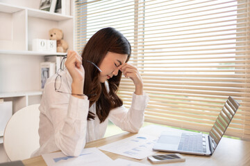 Obraz premium Young woman stressed or worried about doing a wrong job, Despair or disappointment, Sad feeling, Suffering, Desperate, Hopeless, Fail, disastrous, bankrupt, Scared, panicky, Failure of life.