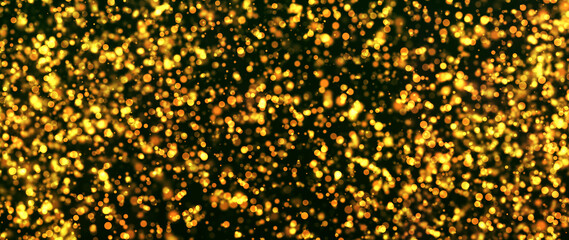 Golden particles shining dust bokeh glitter awards abstract background. Futuristic glittering in space on black background.