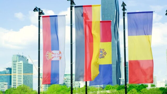 Flags of Croatia, Germany, Romania and other flags of European countries against the background of the sky