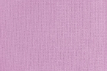 Texture background of pink cotton fabric. Textile structure, cloth surface, weaving of linen fabric closeup, backdrop, wallpaper.