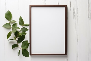 Wooden frame with eucalyptus branches on white background. Flat lay, top view.
