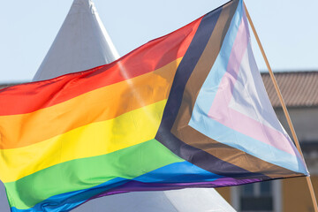 LGBT progress pride flag waving in the wind