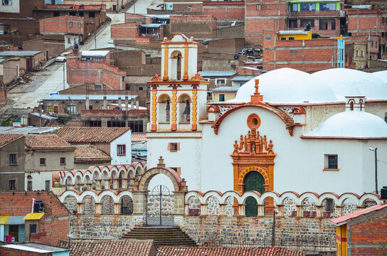 First aboriginal church. Distant view of the ancient San Benito church in Potosi city, Bolivia. Temple with Latin cross and several domes. Southamerica