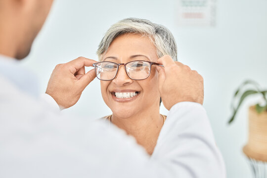 Eye care, glasses and senior patient with doctor, optometry and frame choice with help and people at clinic. Wellness, health and prescription lens, woman and optometrist with trust and eyewear
