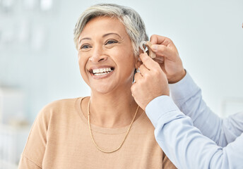 Senior patient, hearing aid and doctor hands, ear and listening, help and trust, healthcare and...