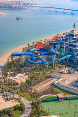 Waterslides in a waterpark on a beach