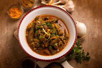 Moroccan liver with parsley black olives and spices