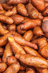 sweet potatoes at a street vegetable market on toronto's spadina avenue  portrait suitable as background