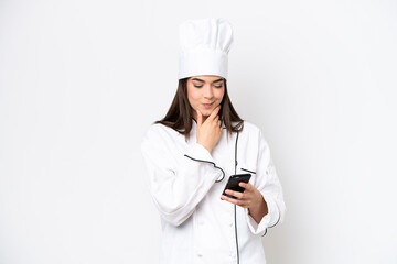 Young Brazilian chef woman isolated on white background thinking and sending a message