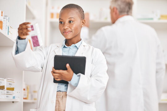 Healthcare, pharmacist and black woman with a tablet, pill box and research on medication. Medical treatment, pharmaceutical and African person with technology, inventory and checking prescription