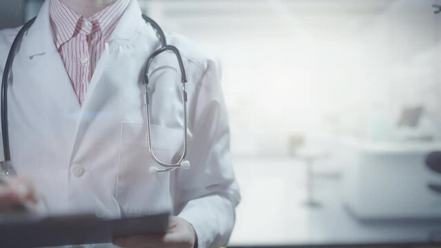 Doctor is holding a notebook in her hand and writing. Free copy space for text or logo. International medical coverage insurance concept. Secure health care and protection. Medical services worldwide