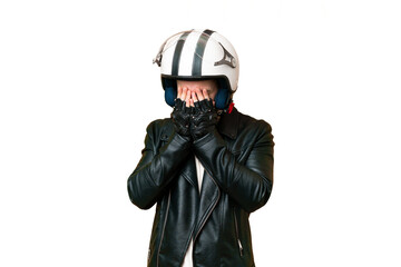Young handsome blonde man with a motorcycle helmet over isolated chroma key background with tired and sick expression