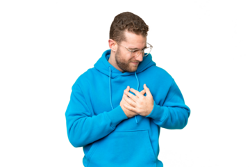 Young handsome blonde man over isolated chroma key background having a pain in the heart