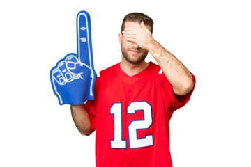 sports fan man over isolated chroma key background covering eyes by hands. Do not want to see something