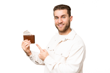 Young handsome blonde man holding a wallet over isolated chroma key background and pointing it