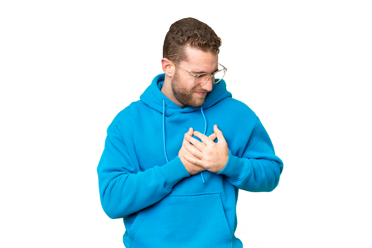 Young handsome blonde man over isolated chroma key background having a pain in the heart