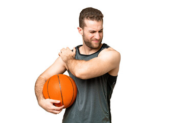 Obraz premium Handsome young man playing basketball over isolated chroma key background suffering from pain in shoulder for having made an effort