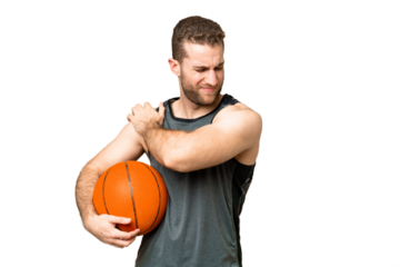 Handsome young man playing basketball over isolated chroma key background suffering from pain in shoulder for having made an effort