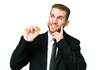 Young business blonde man holding a Bitcoin over isolated chroma key background thinking an idea while looking up