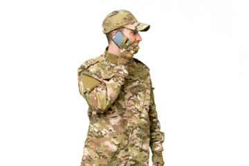 Military man over isolated chroma key background keeping a conversation with the mobile phone with someone