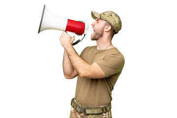 Military with dog tag over isolated chroma key background shouting through a megaphone