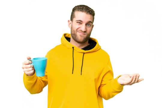Young handsome blonde man holding cup of coffee over isolated background making doubts gesture while lifting the shoulders