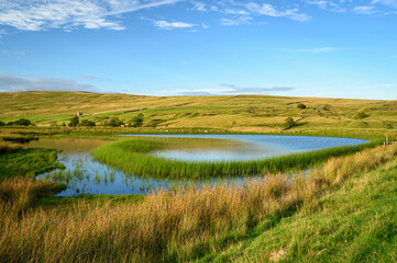 Westgate Tarn from the south, also called West Slitt Dam and used in the nearby old Lead Mine at Weardale, County Durham in the North Pennines AONB