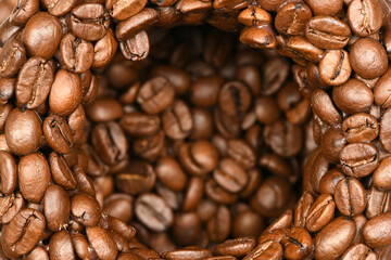 Roasted coffee beans background top view