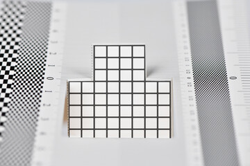 Reliably test DSLR Autofocus system performance. Black and white abstract.