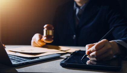 Business and lawyers discussing contract papers with brass scale on desk in office. Law, legal...